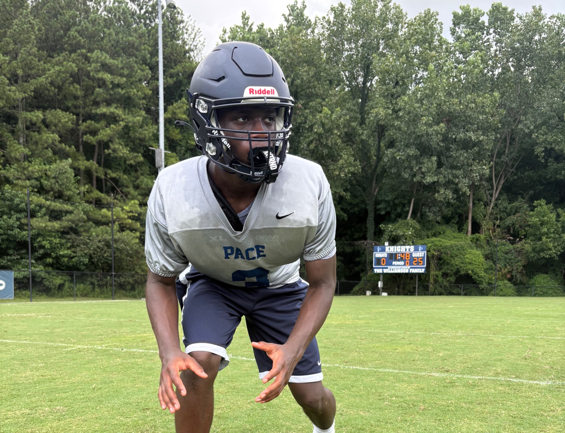 Jace Dunn in Pace Academy football gear during practice on the Knights field