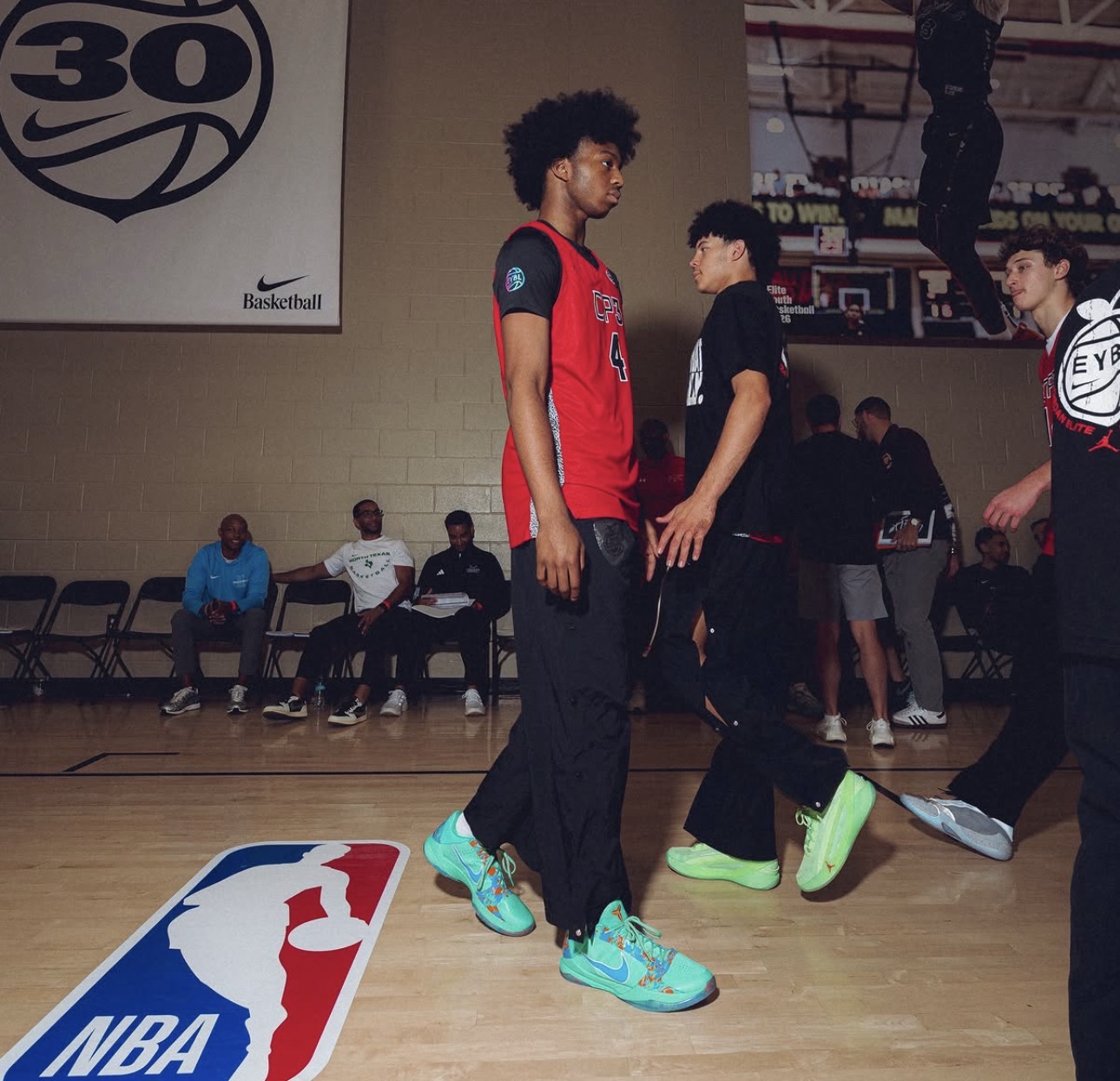 AJ Williams of Team CP3 walks off the court at Nike EYBL Peach Jam after another dominant performance. The nation's No. 1 Class of 2028 prospect starred against older competition while earning blue blood offers from Kansas, North Carolina, and Duke.